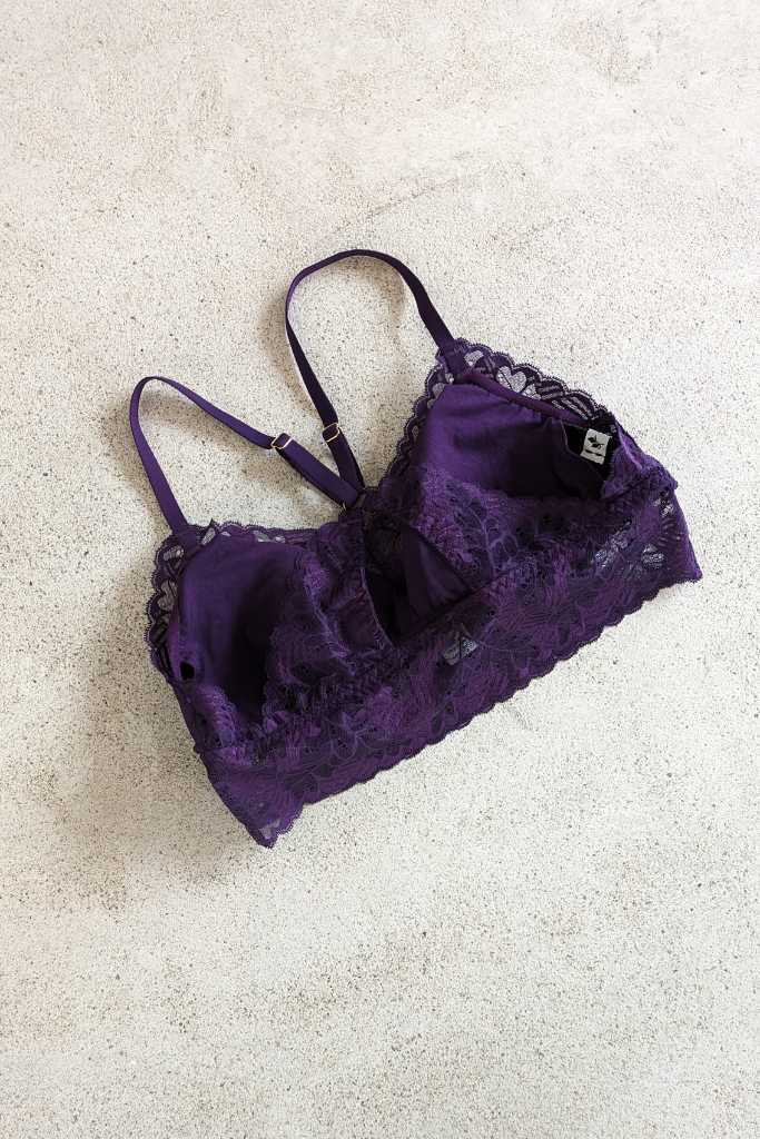 Custom-made bra with removable pads in dark purple.