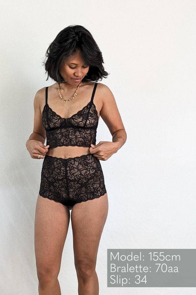 the woman wears the beautiful Joy set and puts on the Bralette .