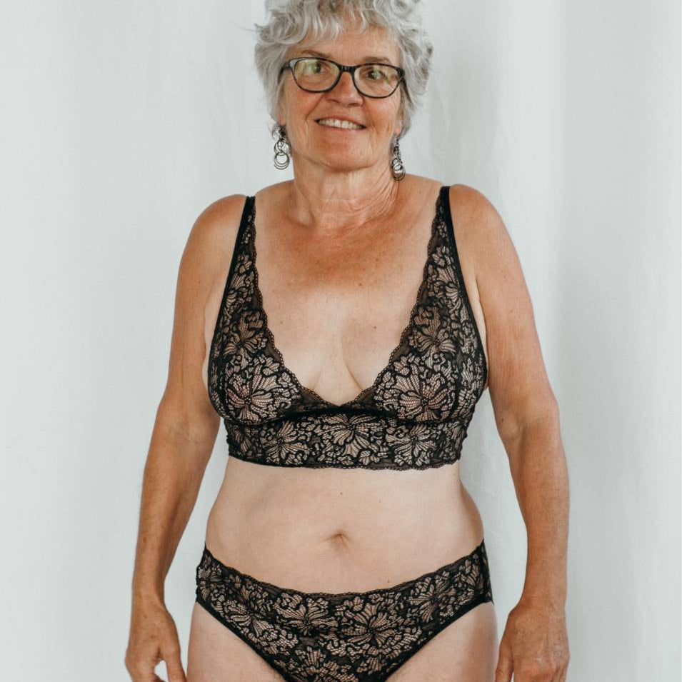 Belle Bralette: High quality black lace lingerie, full body shot.