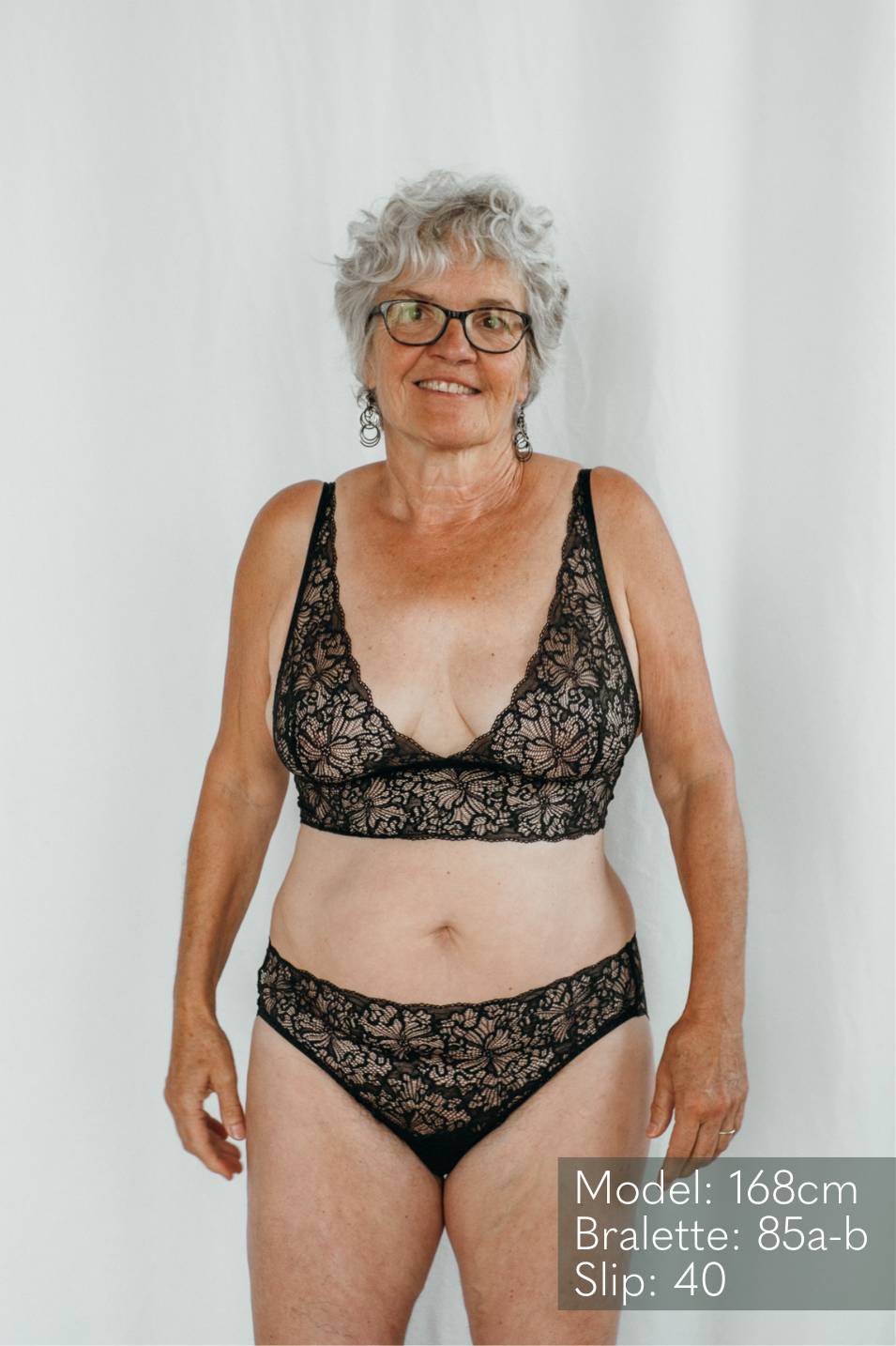 Belle Bralette: High quality black lace lingerie, full body shot.