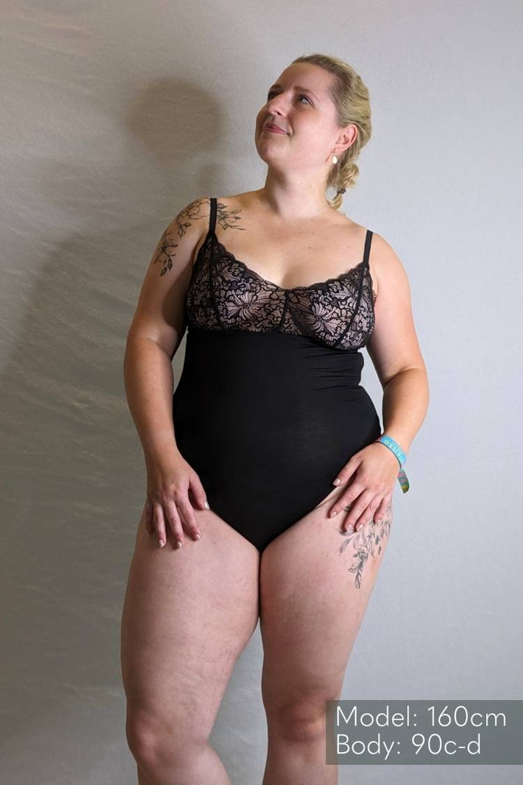 Woman wears Body with romantic lace.