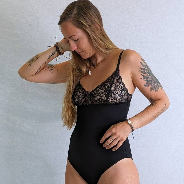 Model wears the Body Jina in black with the cups made of fine lace.