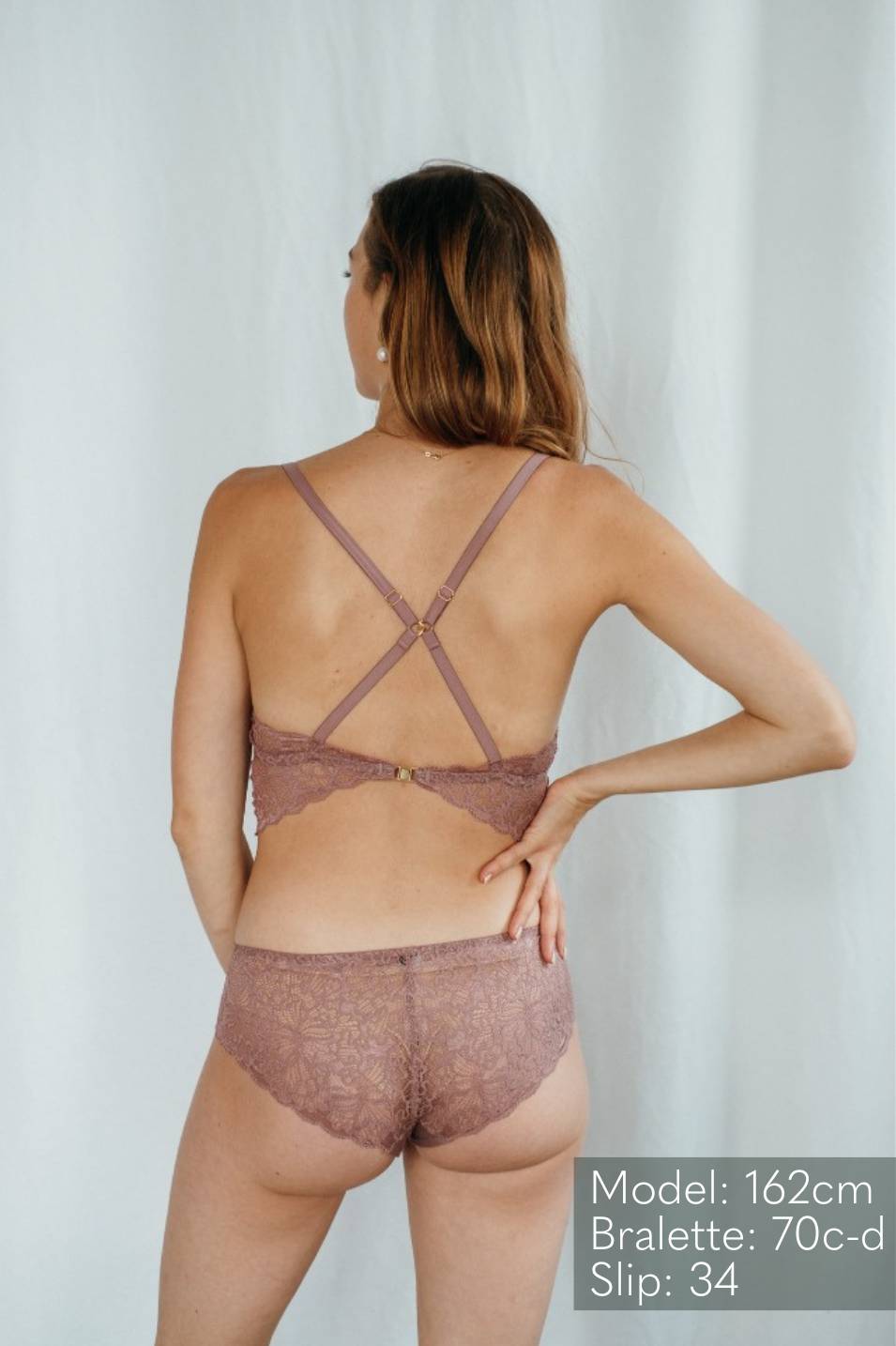 Model wears Bralette with crossed straps in smockey rose with matching slip.