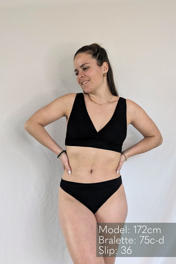 Model with dark hair wears a String and a Bralette "Betty" made of sustainable fabric.