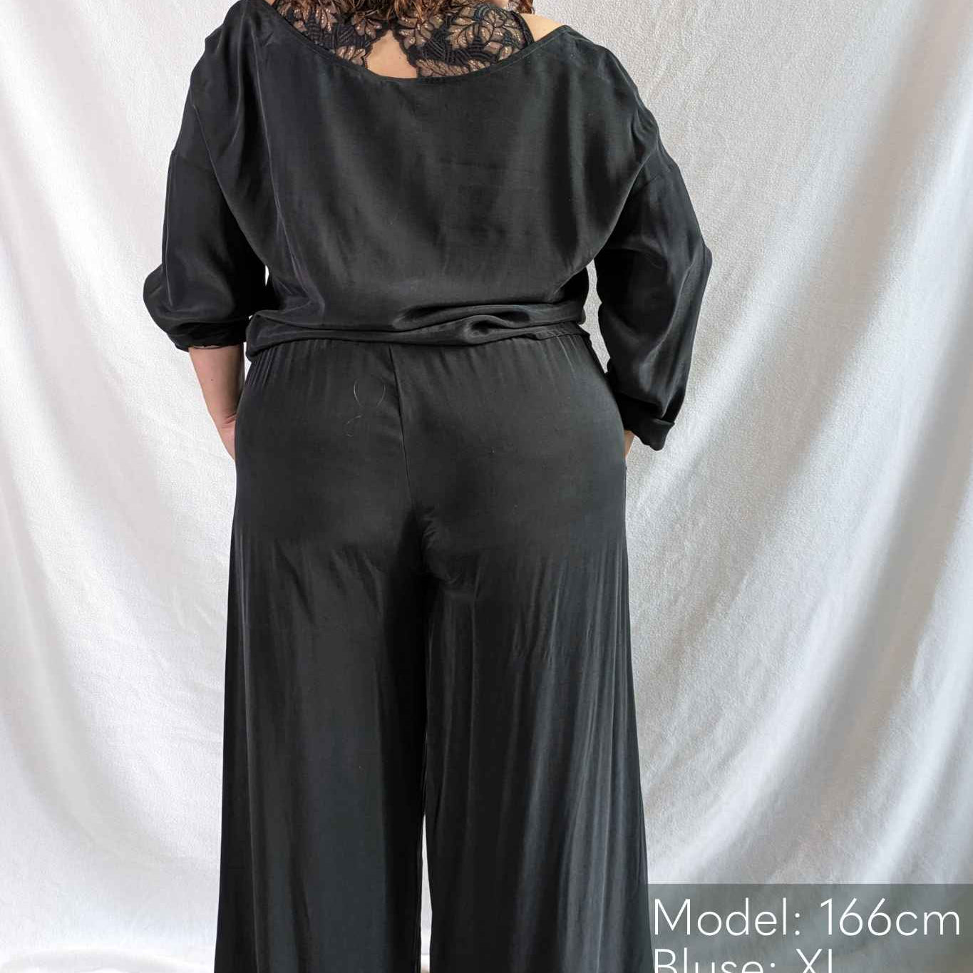 Woman wears pyjamas Coco from thoughts of september