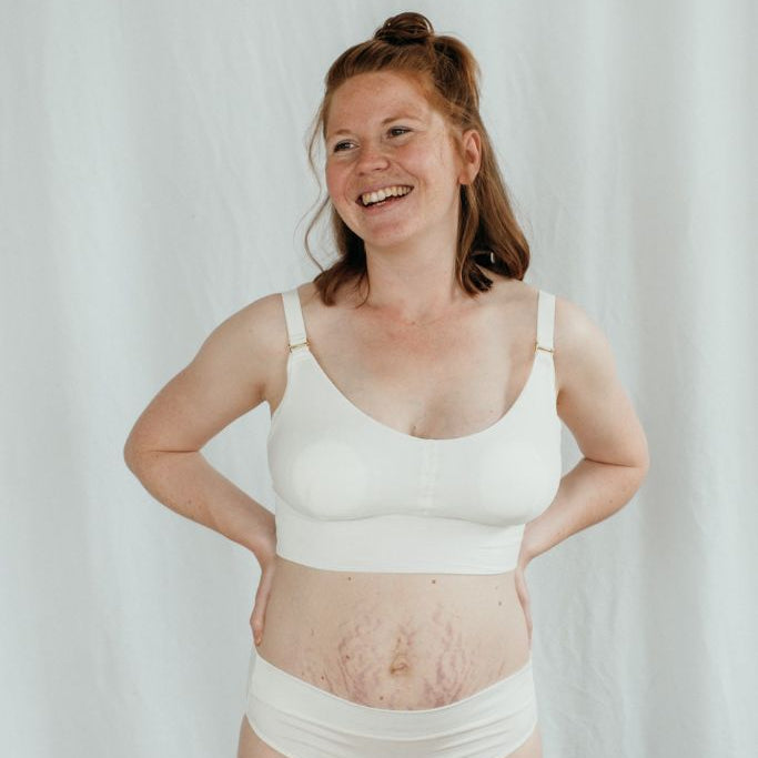 the laughing woman presents the Emma Mama Bralette and slip in white