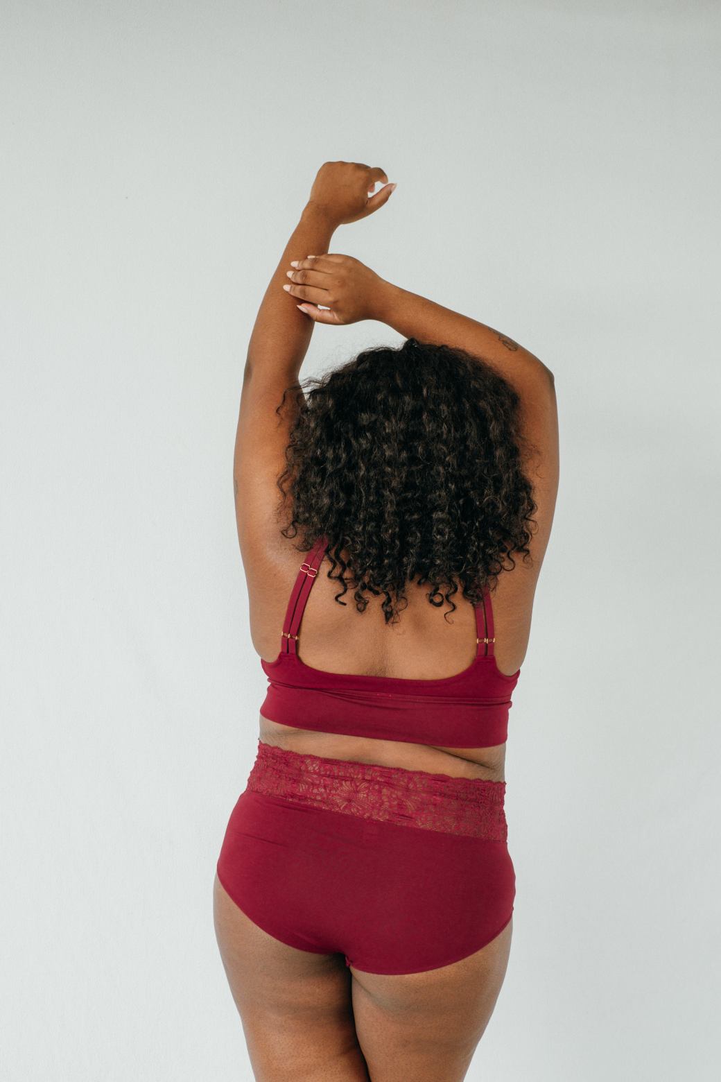 Bralette and High Waist slip Nelly made of sustainable lace and Tencel in dark red.