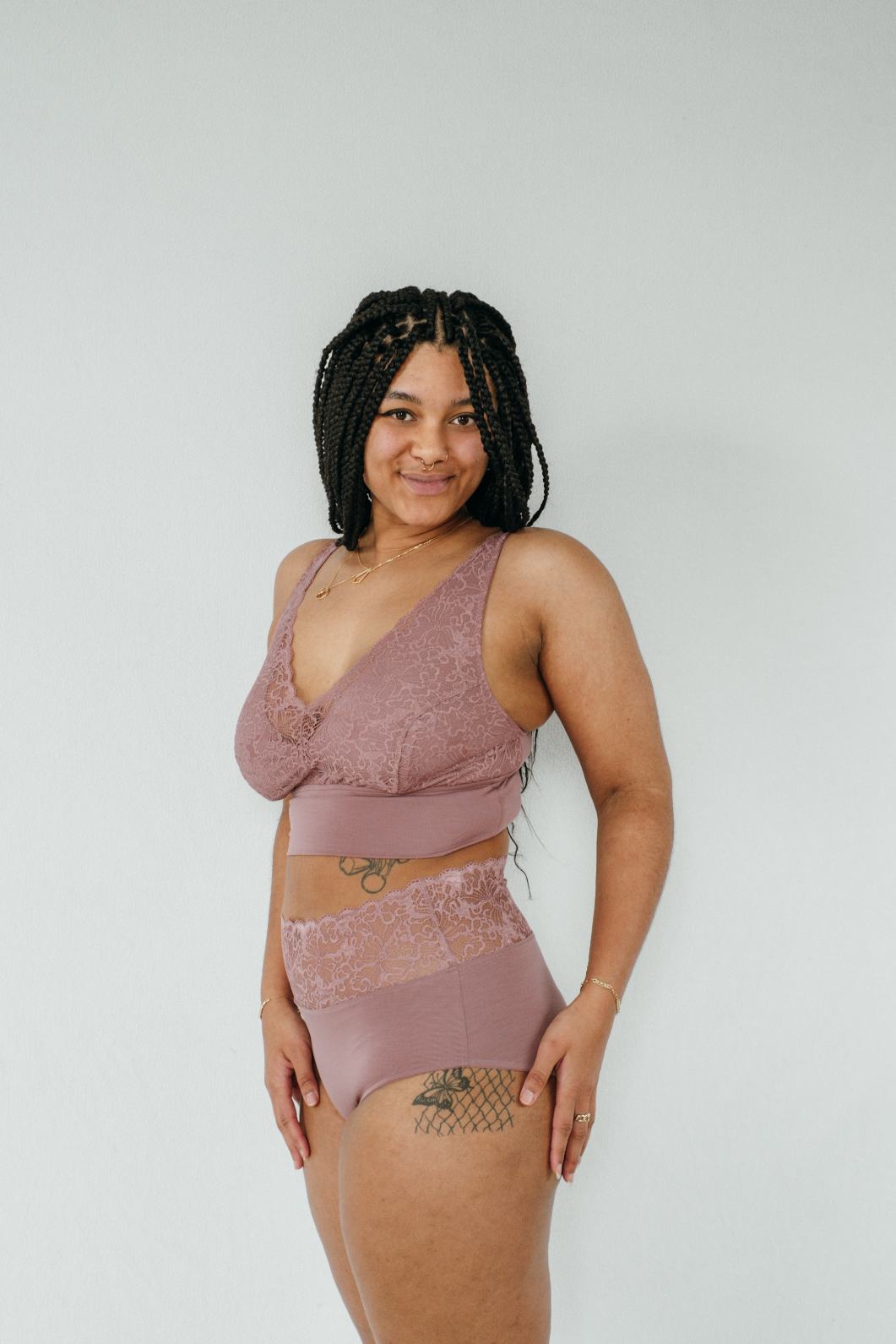 Bralette and High Waist slip Nelly in old rose, photographed sideways on model. 